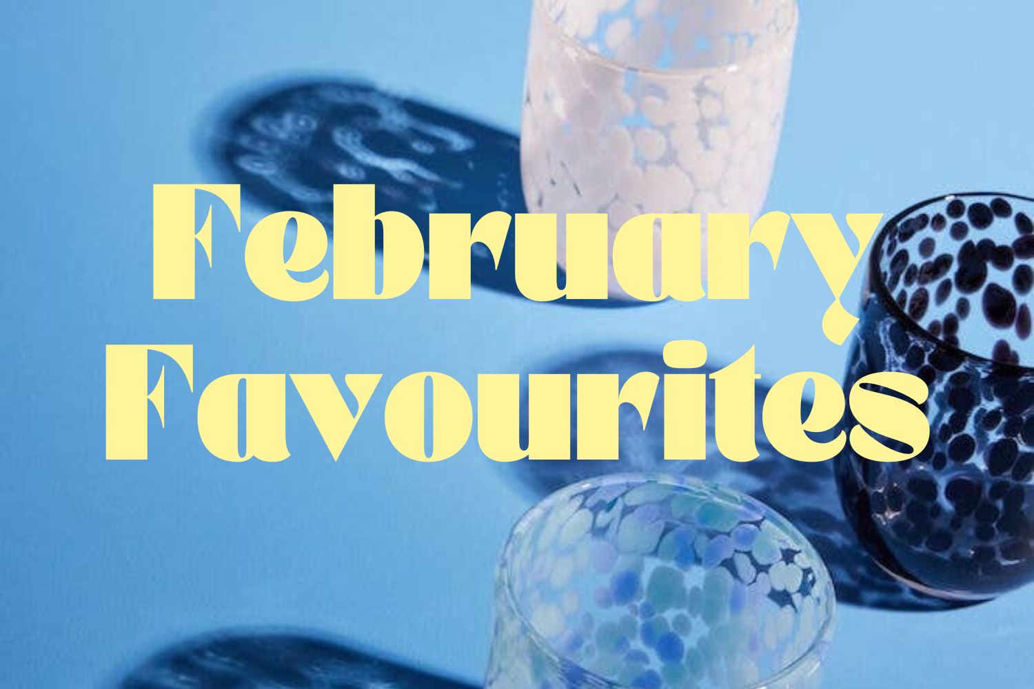 3 colourful, spotty glasses aainst a blue background with text 'February Favourites'