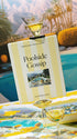 'Poolside Gossip' puzzle box and puzzle with a martini glass on a poolside setting