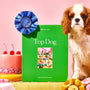 Green puzzle box titled 'Top Dog' with a cavalier king charles Spaniel and cake in the background