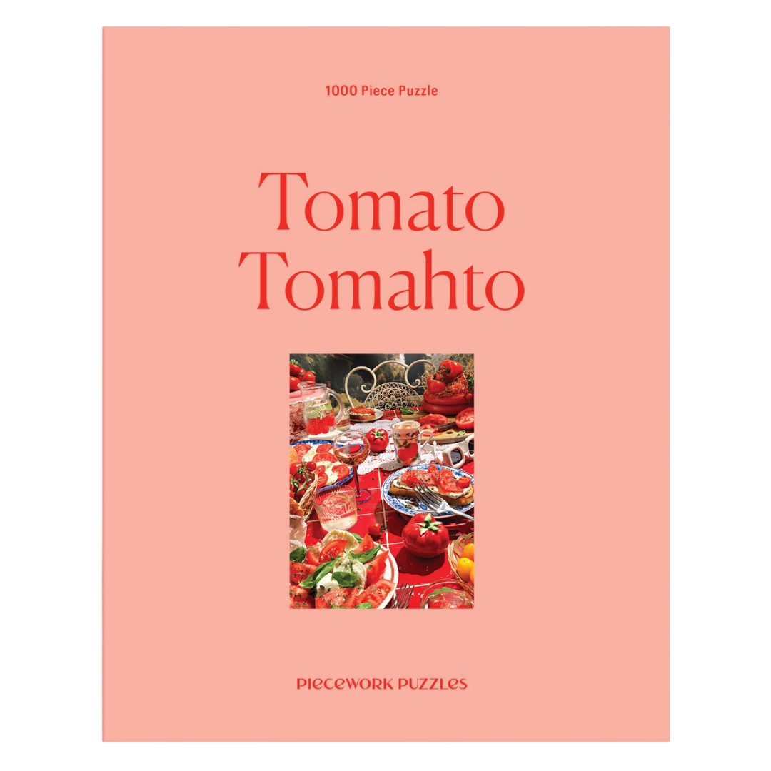 Puzzle box with 'Tomato Tomahto' text and images of tomatoes on a pink background