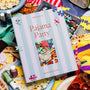 Pajama Party puzzle box with puzzle pieces and snacks on a table